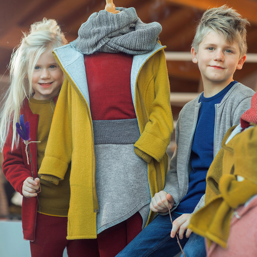 Disana kids merino wool winter clothes—organic sweater layered for boys and girls