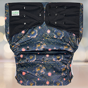 EcoAble Diaper Cover 2.0 showcasing Cyber Flower—circuit lines intertwined with floral motifs.